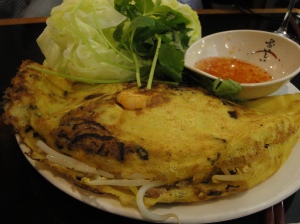 Vietnamese Crepe (Banh Xeo): pork, prawns, mung beans, bean shoots and served with lettuce, herbs & sauce)